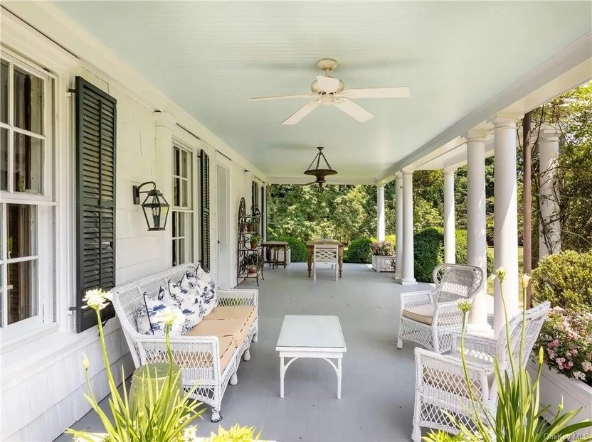 A veranda with gorgeous views of the grounds.