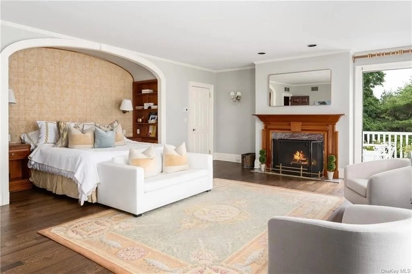 Primary suite with cozy fireplace.