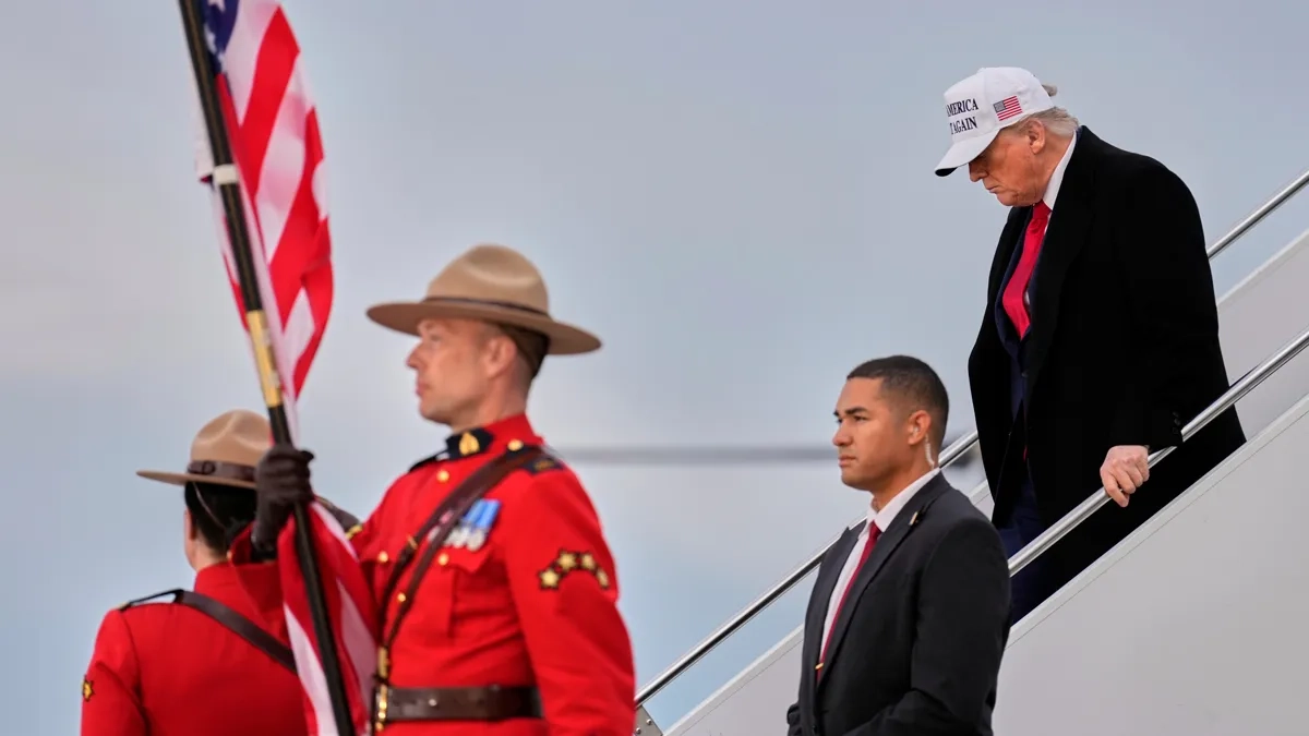 President Donald Trump arrives at Calgary International Airport on June 15.