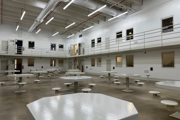 A judge has halted CoreCivic, on Wednesday, June 4, 2025, from housing immigrants facing possible deportation in a shuttered facility that the private prison operator now calls the Midwest Regional Reception Center, in Leavenworth, Kan., pictured Monday, March 3, 2025, unless it can get a permit from frustrated city officials. (AP Photo/Nick Ingram)