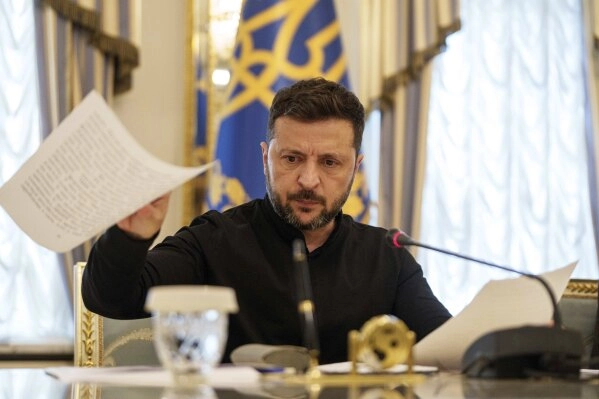 Ukrainian President Volodymyr Zelenskyy speaks to journalists during a press conference in Kyiv, Ukraine, on Wednesday, June 4, 2025. (AP Photo/Evgeniy Maloletka)