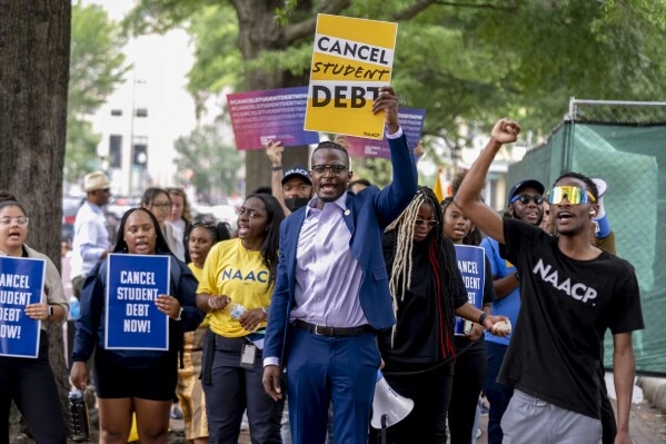 People demonstrate in Lafayette Park across from the White House in Washington, June 30, 2023, after a sharply divided Supreme Court has ruled that the Biden administration overstepped its authority in trying to cancel or reduce student loan debts for millions of Americans. (AP Photo/Andrew Harnik, File)