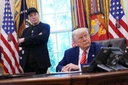 WASHINGTON, DC - MAY 30: Tesla CEO Elon Musk and U.S. President Donald Trump listen to a question from reporters in the Oval Office of the White House on May 30, 2025 in Washington, DC. Musk, who served as an adviser to Trump and led the Department of Government Efficiency, announced he would leave his role in the Trump administration to refocus on his businesses. (Photo by Kevin Dietsch/Getty Images)