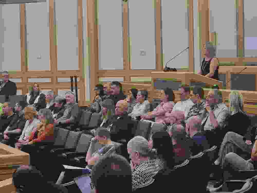 Several business owners at city hall Wednesday.