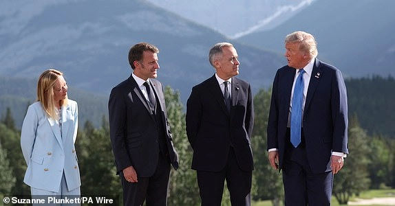 Italian Prime Minister Giorgia Meloni, French President Emmanuel Macron, Canada's Prime Minister Mark Carney, and US President Donald Trump attend a family photo session during the G7 summit in Kananaskis, Alberta, Canada. Picture date: Monday June 16, 2025. PA Photo. Photo credit should read: Suzanne Plunkett/PA Wire