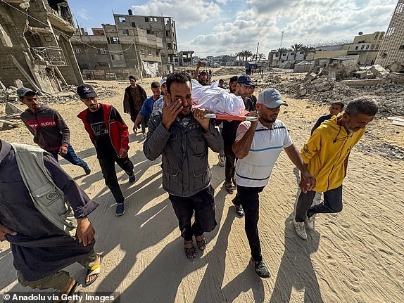 KHAN YUNIS, GAZA - JUNE 16: Relatives of Palestinians who lost their lives after Israeli army strikes targeted several locations, including tents for displaced people in the al-Mawasi area, mourn for them after they are being brought to the Nasser Hospital for their funeral process in Khan Yunis, Gaza on June 16, 2025. (Photo by Abdallah F.s. Alattar/Anadolu via Getty Images)