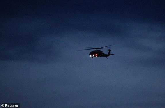 Marine One carrying U.S. President Donald Trump flies in the sky, after Trump departed early from the G7 Leaders' Summit in the Rocky Mountain resort town of Kananaskis to return to Washington, near Calgary International Airport in Calgary, Alberta, Canada, June 16, 2025. REUTERS/Todd Korol/Pool