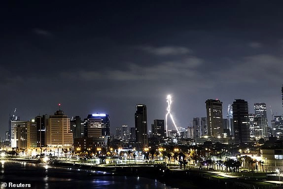 An interceptor flies in the sky as missiles from Iran are fired to Israel, as seen from Tel Aviv, Israel, June 17, 2025. REUTERS/Jamal Awad