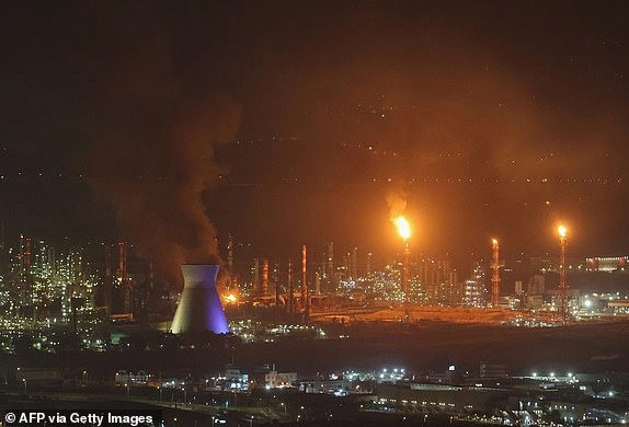 Smoke billows from a site in the city of Haifa on June 16, 2025, following a fresh barrage of Iranian missiles. Israel's military warned on June 16 of a new missile salvo incoming from Iran, as AFP journalists reported loud explosions in Jerusalem and fires outside the coastal city of Haifa. 
