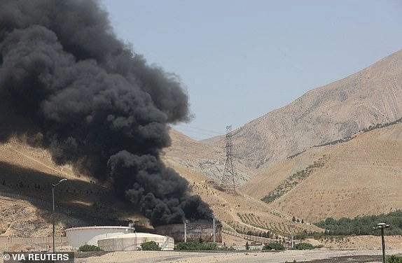 Smoke rises following what Iran says was an Israeli attack on Sharan Oil depot in Tehran, Iran, June 16, 2025. Majid Asgaripour/WANA (West Asia News Agency) via REUTERS ATTENTION EDITORS - THIS PICTURE WAS PROVIDED BY A THIRD PARTY TPX IMAGES OF THE DAY