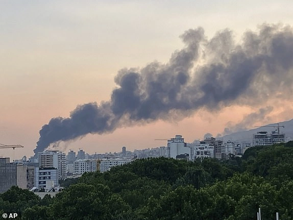 Smoke rises from the building of Iran's state-run television after an Israeli strike in Tehran, Iran, Monday, June 16, 2025. (AP Photo)