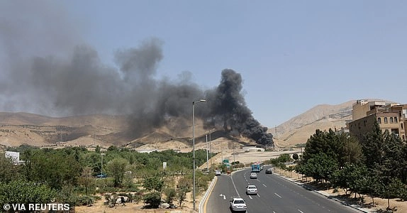 Smoke rises following what Iran says was an Israeli attack on Sharan Oil depot in Tehran, Iran, June 16, 2025. Majid Asgaripour/WANA (West Asia News Agency) via REUTERS ATTENTION EDITORS - THIS PICTURE WAS PROVIDED BY A THIRD PARTY TPX IMAGES OF THE DAY