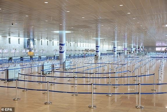 epa12178563 An empty departure terminal at Ben Gurion Airport near Tel Aviv, Israel, 16 June 2025. The Israel Airports Authority (IAA) suspended all travel at the airport after Israel launched strikes on Iran on 13 June, leaving tens of thousands of Israelis stranded abroad. EPA/ABIR SULTAN