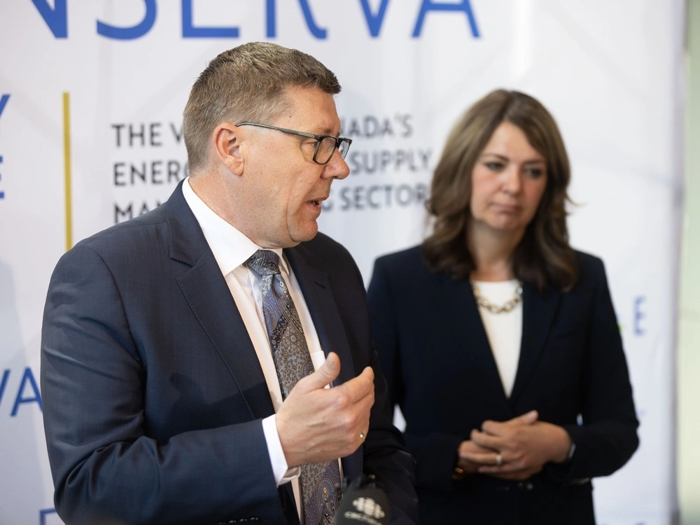 Alberta Premier Danielle Smith and Saskatchewan Premier Scott Moe take part in a joint press conference following a talk hosted by Enserva in Calgary on Monday, June 16, 2025. Brent Calver/Postmedia