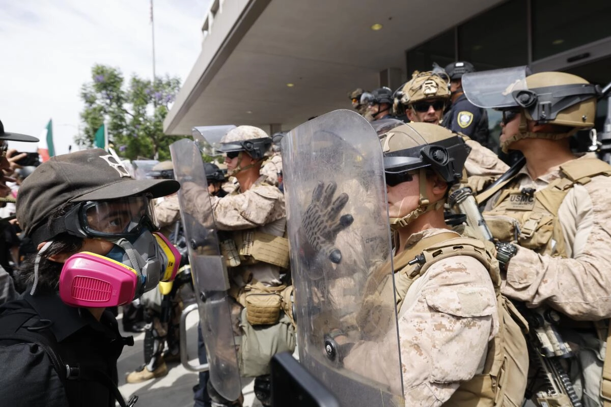 Marines push back anti-ICE protesters