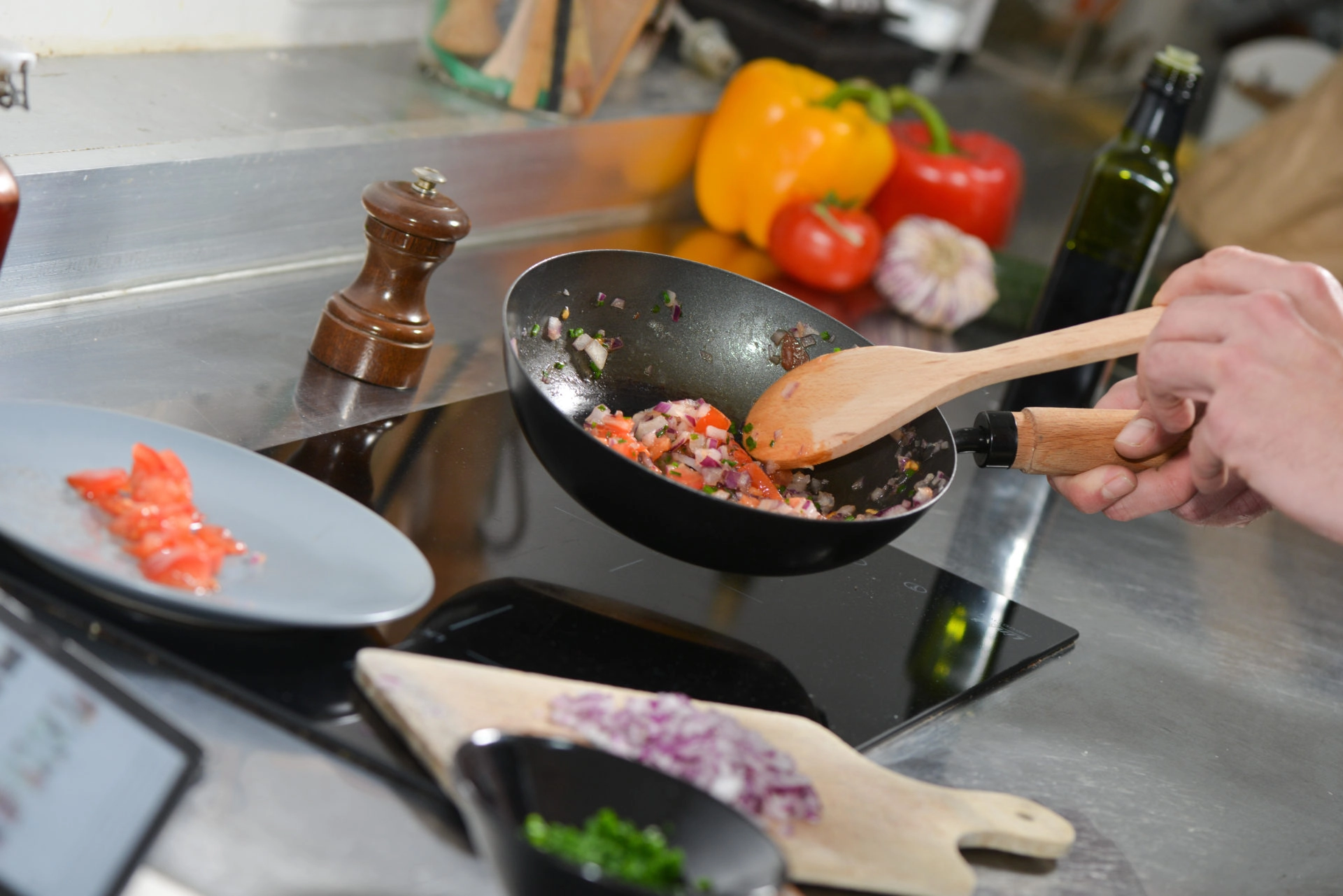 A chef cooks in a restaurant kitchen