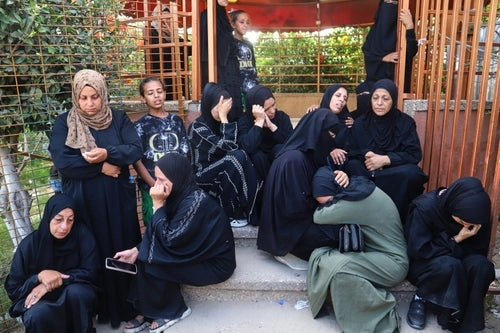 Palestinian women mourn their relatives who were killed in an Israeli strike, at Nasser Hospital in Khan Younis, Gaza, on June 17, 2025.