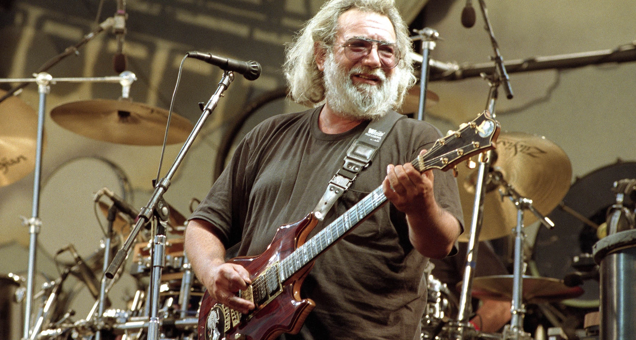 Jerry Garcia performs with his custom Doug Irwin Rosebud at a Grateful Dead gig in 1991, California.