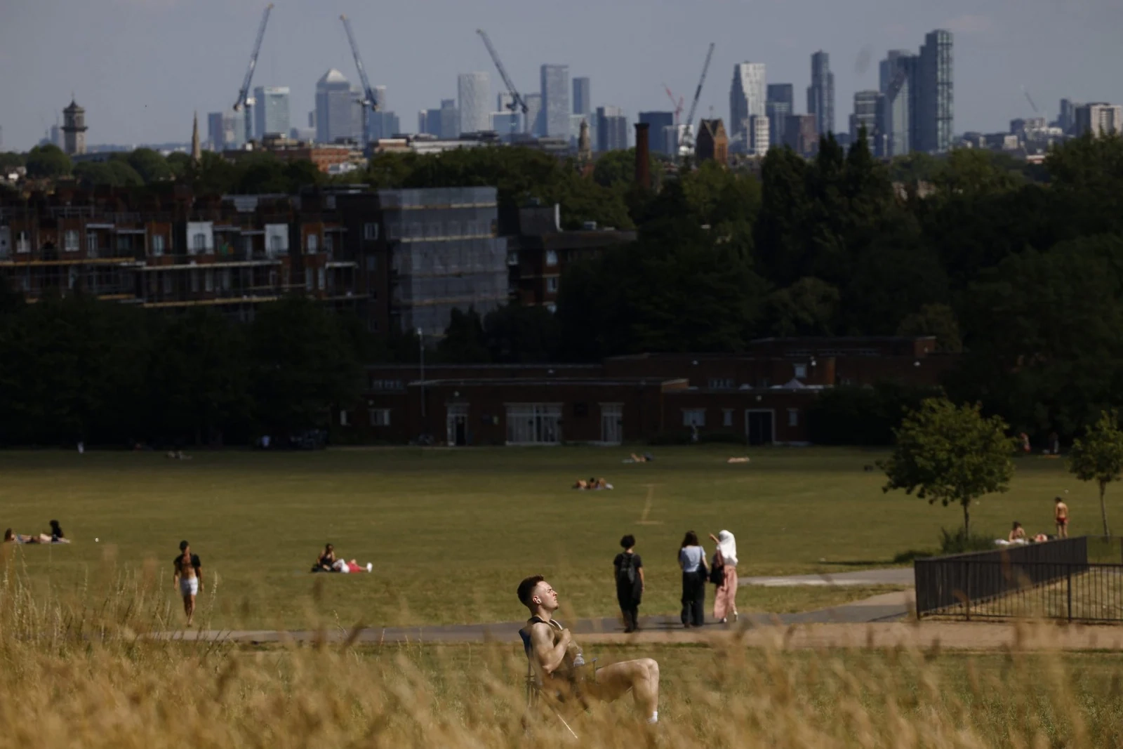 In the UK, the Met Office expanded amber heat warnings as temperatures hit 34�C in London, and Wimbledon logged its hottest opening day ever at 31.4�C. (Image: AFP)