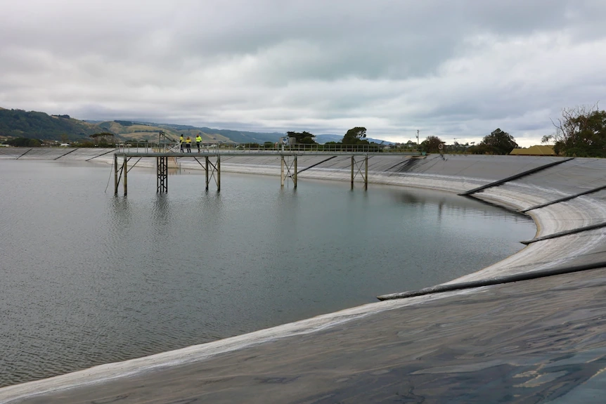 A reservoir at a low level of water.