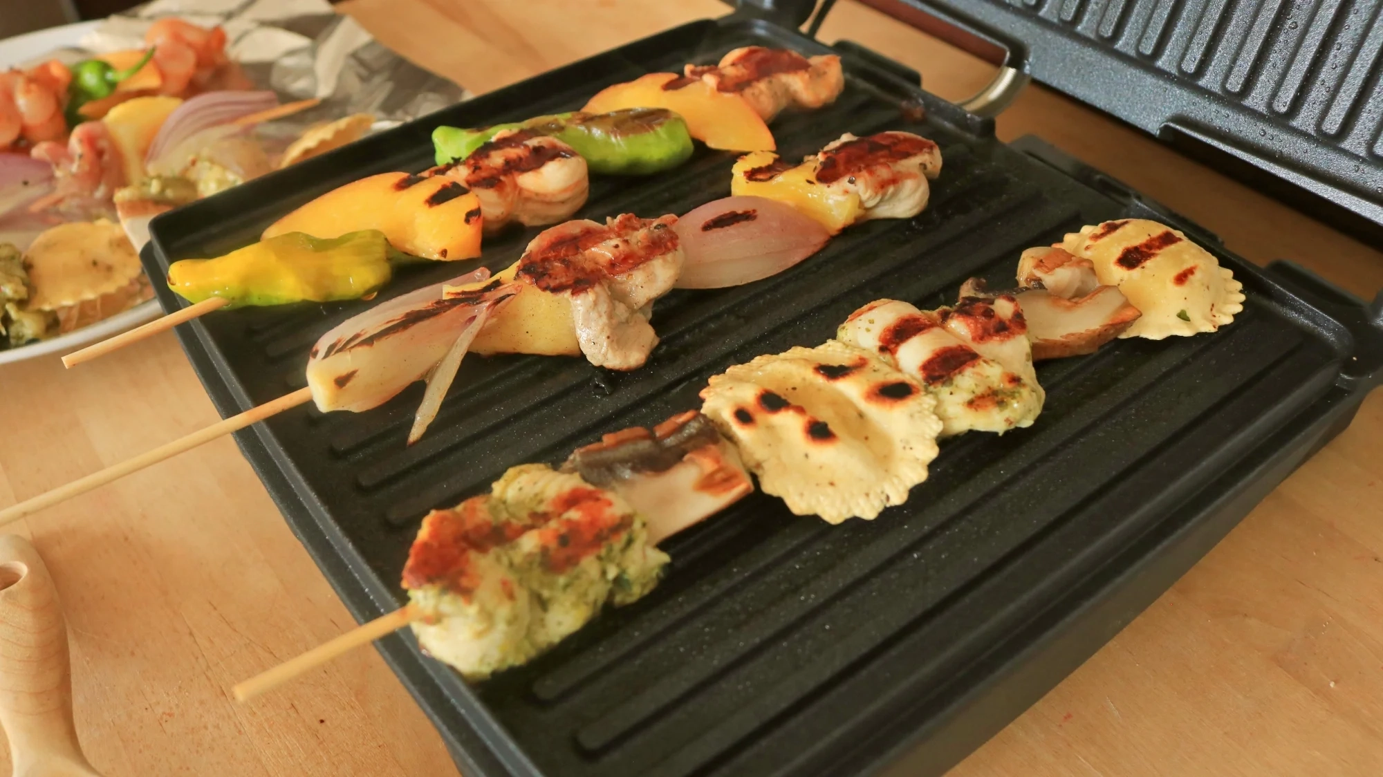 Skewers on an indoor electric grill.