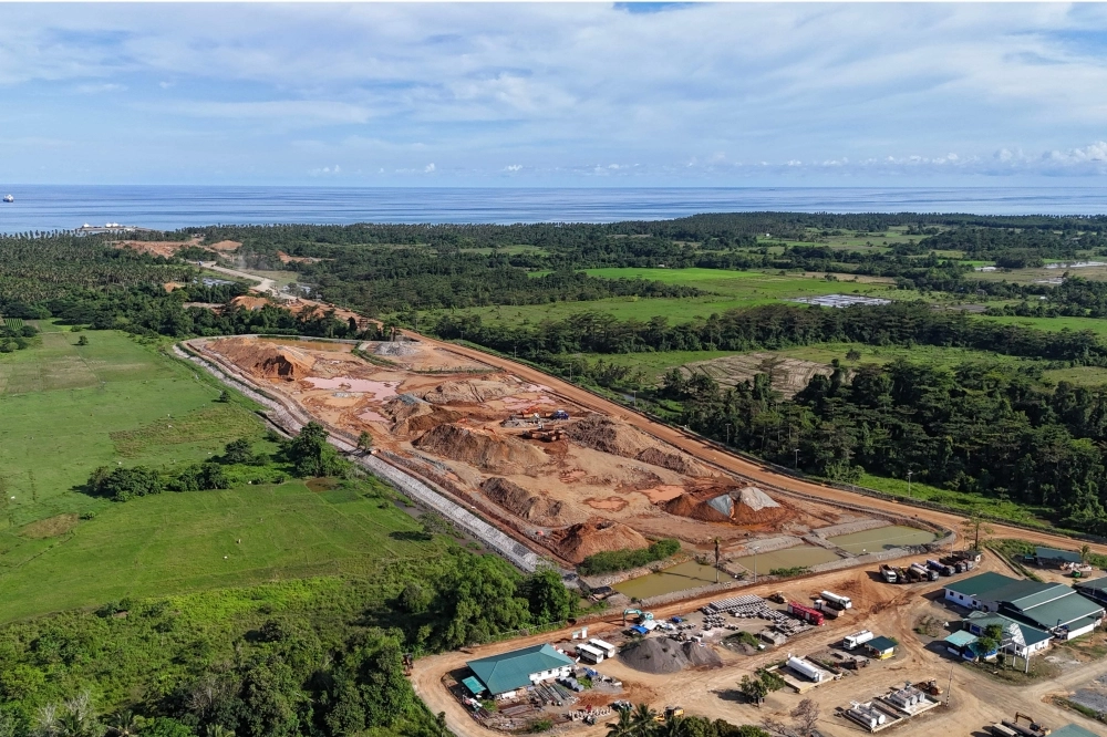 This aerial photo taken on May 22, 2025 shows a general view of stockpiles of nickel ore near farms at Maasin village in Brooke's Point, Palawan province. AFP pic
