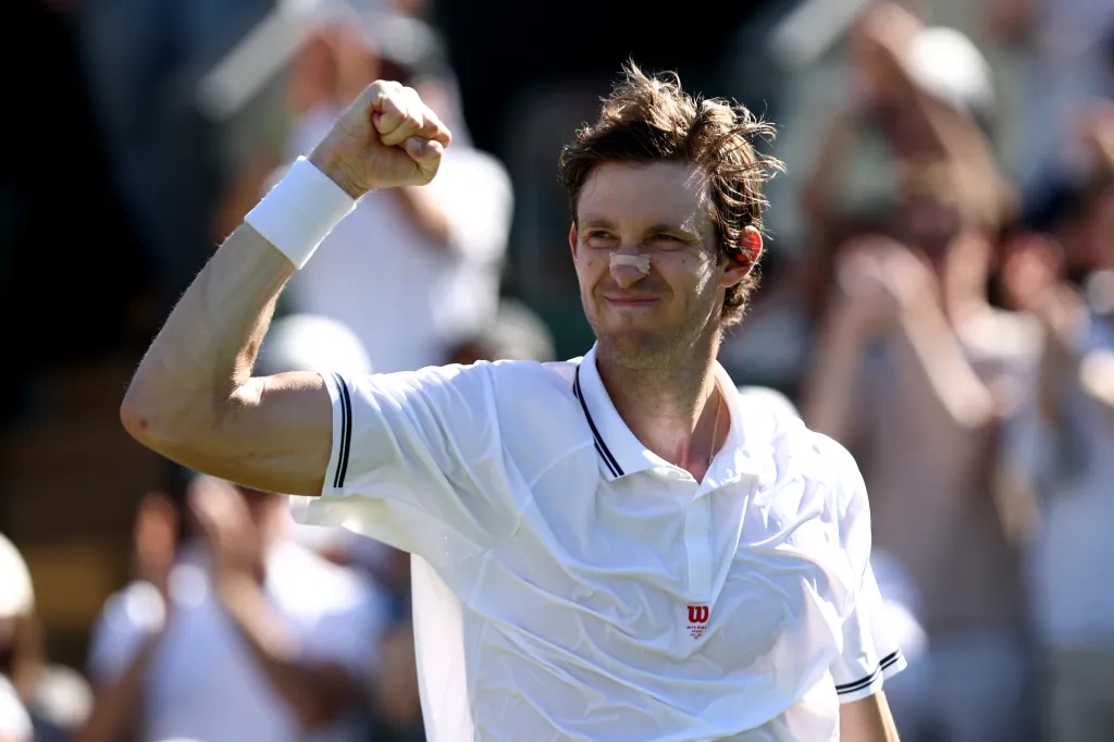 Nicolas Jarry celebrates winning a Wimbledon match.