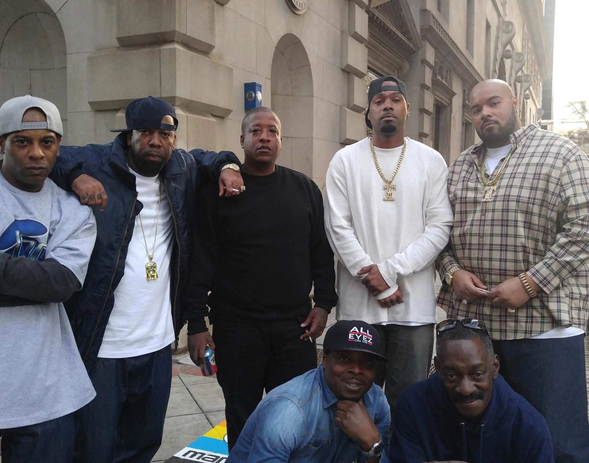 Behind-the-scenes photo of the film *All Eyez on Me* cast and crew.