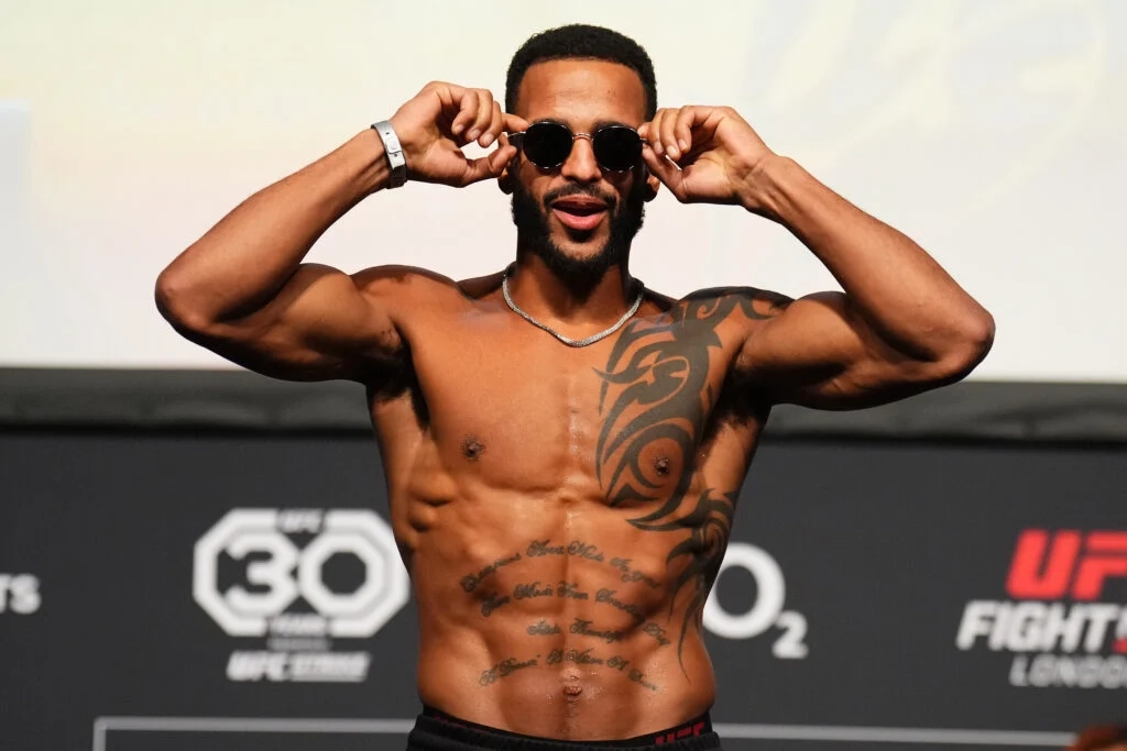 Danny Roberts poses on the scales ahead of UFC Fight Night: Aspinall v Tybura