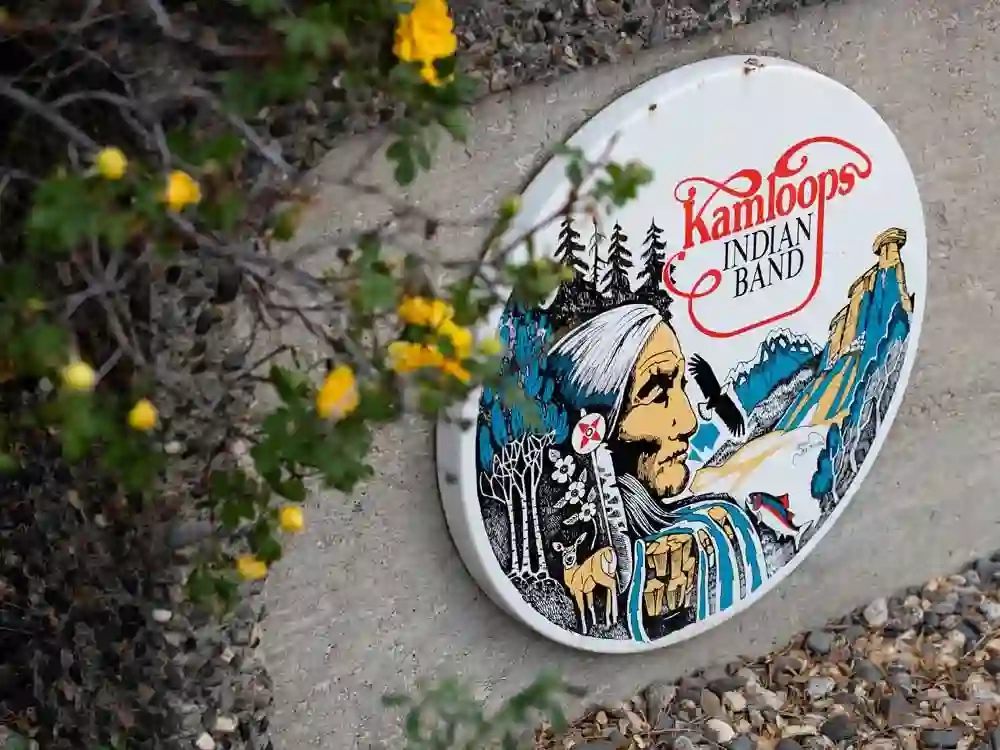 A sign is seen outside of the former Kamloops Indian Residential School on Tkemlups te Secw�pemc First Nation in Kamloops, B.C. on Thursday, May 27, 2021.