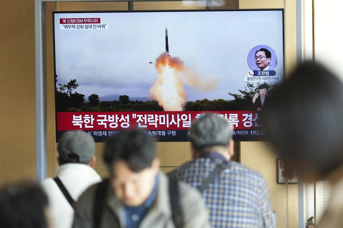 A TV screen showing the launch of a North Korean intercontinental ballistic missile on Oct. 31.