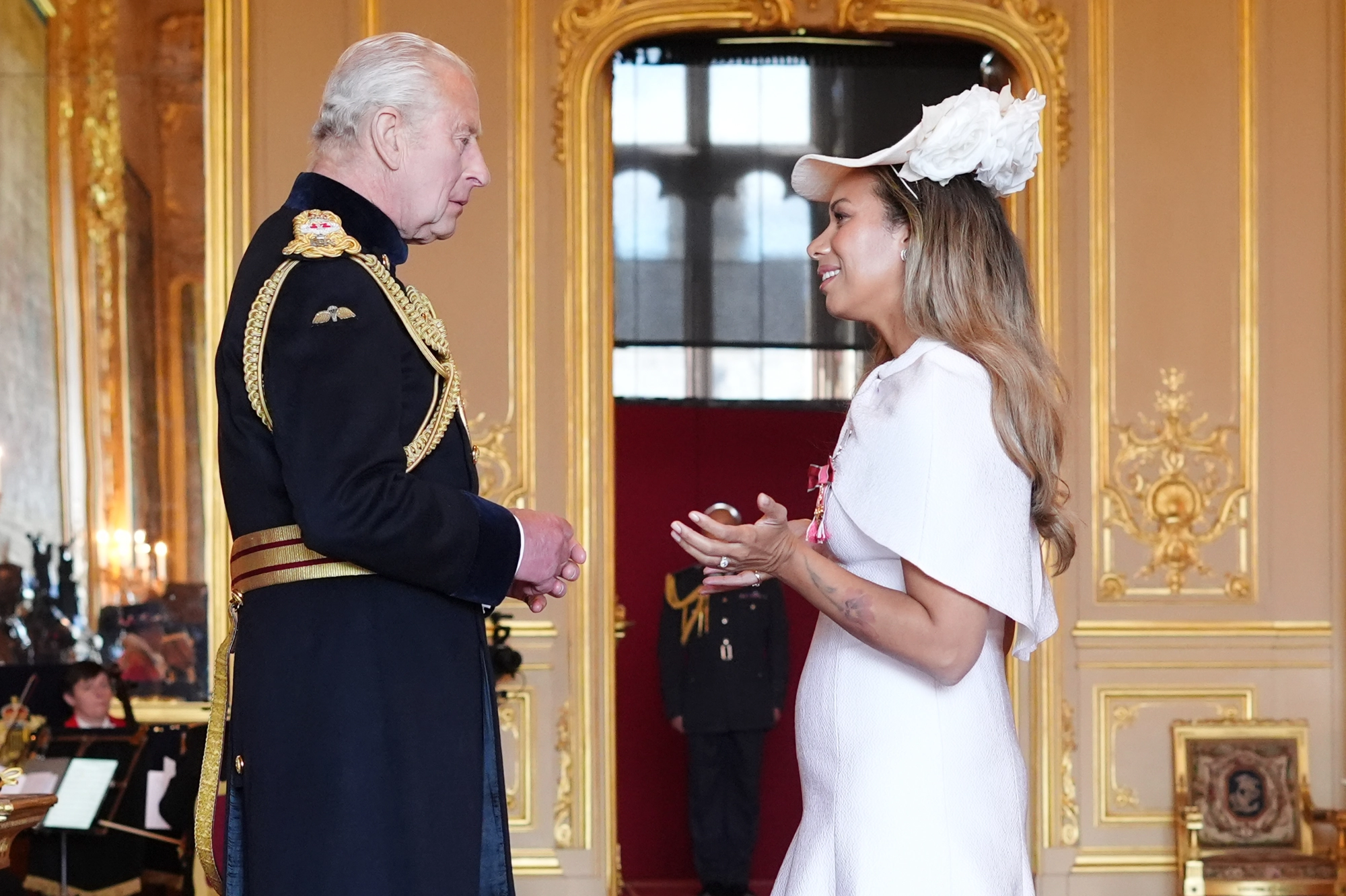 Leona Lewis receives an OBE from King Charles III at Windsor Castle.