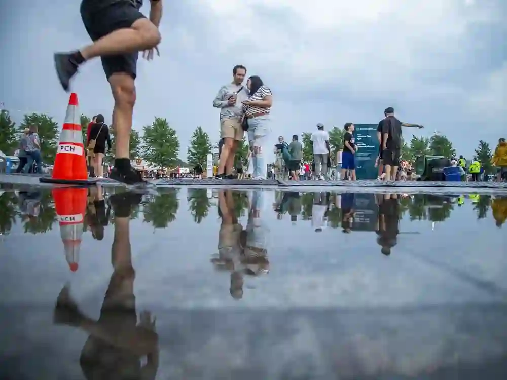 Festival-goers at Ottawa Bluesfest on closing night, Sunday, July 20, 2025, soaked up every last beat at LeBreton Flats, despite a brief downpour that briefly sent music lovers seeking cover before the event wrapped up for the year.