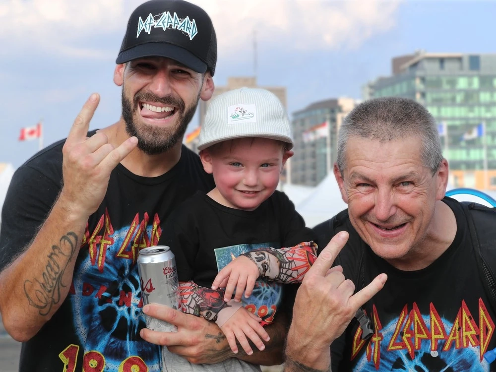 It was three generations of Perron boys (from left: dad Gabriel, grandson Victor and grandpa Joel Perron) who came from Montreal to see Def Leppard on Day 5 of Bluesfest on Wednesday.