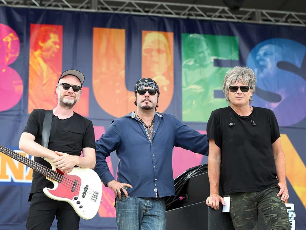 Windsor rock trio The Tea Party onstage during LiUNA Bluesfest Windsor in 2017. From left: Stuart Chatwood, Jeff Martin, and Jeff Burrows.