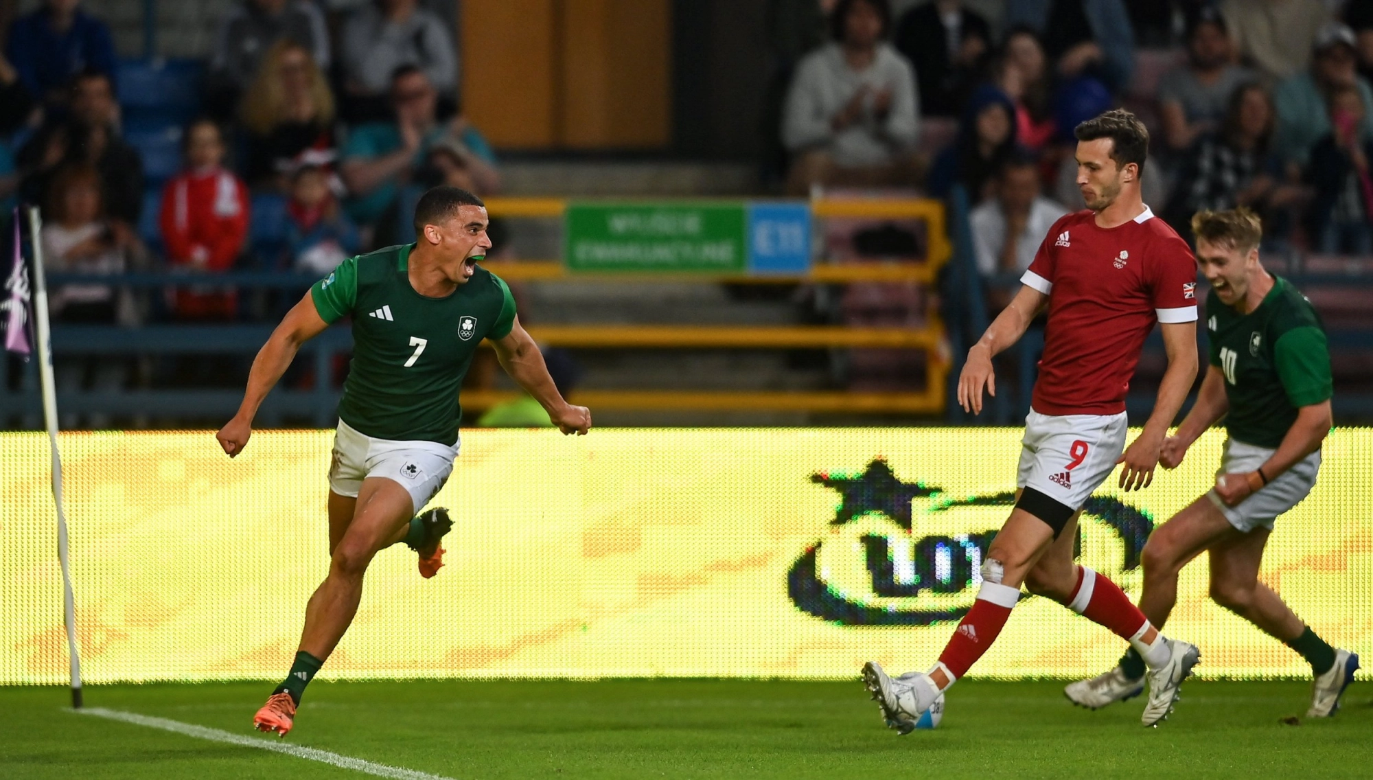 Jordan Conroy of Ireland celebrating after scoring a try in the Men's Rugby Sevens final.