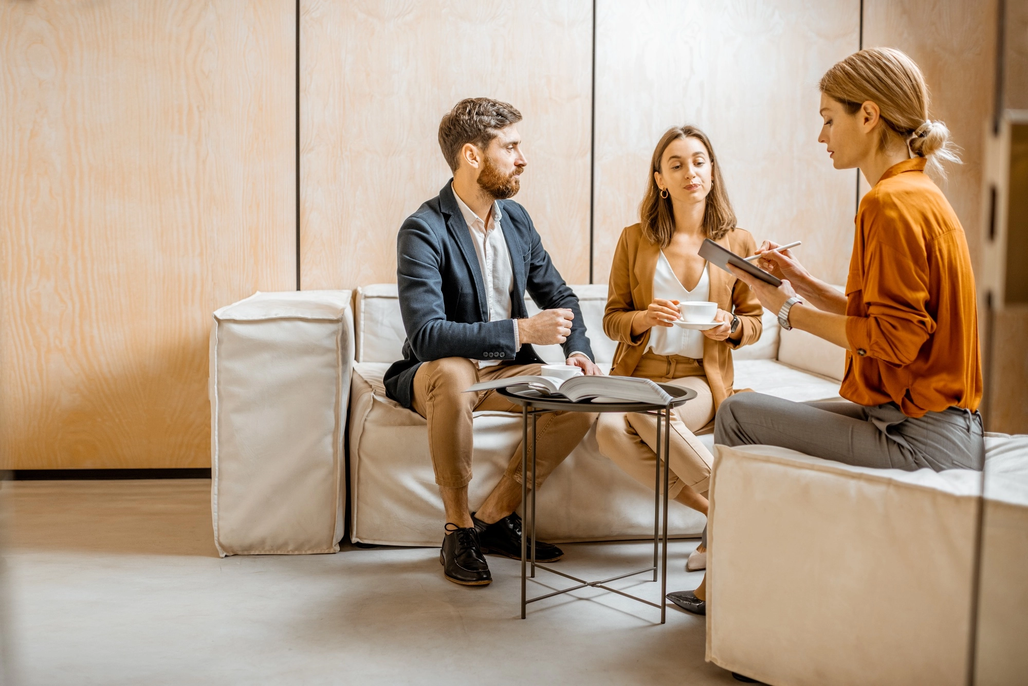 Couple at a reception at sales department or psychotherapist