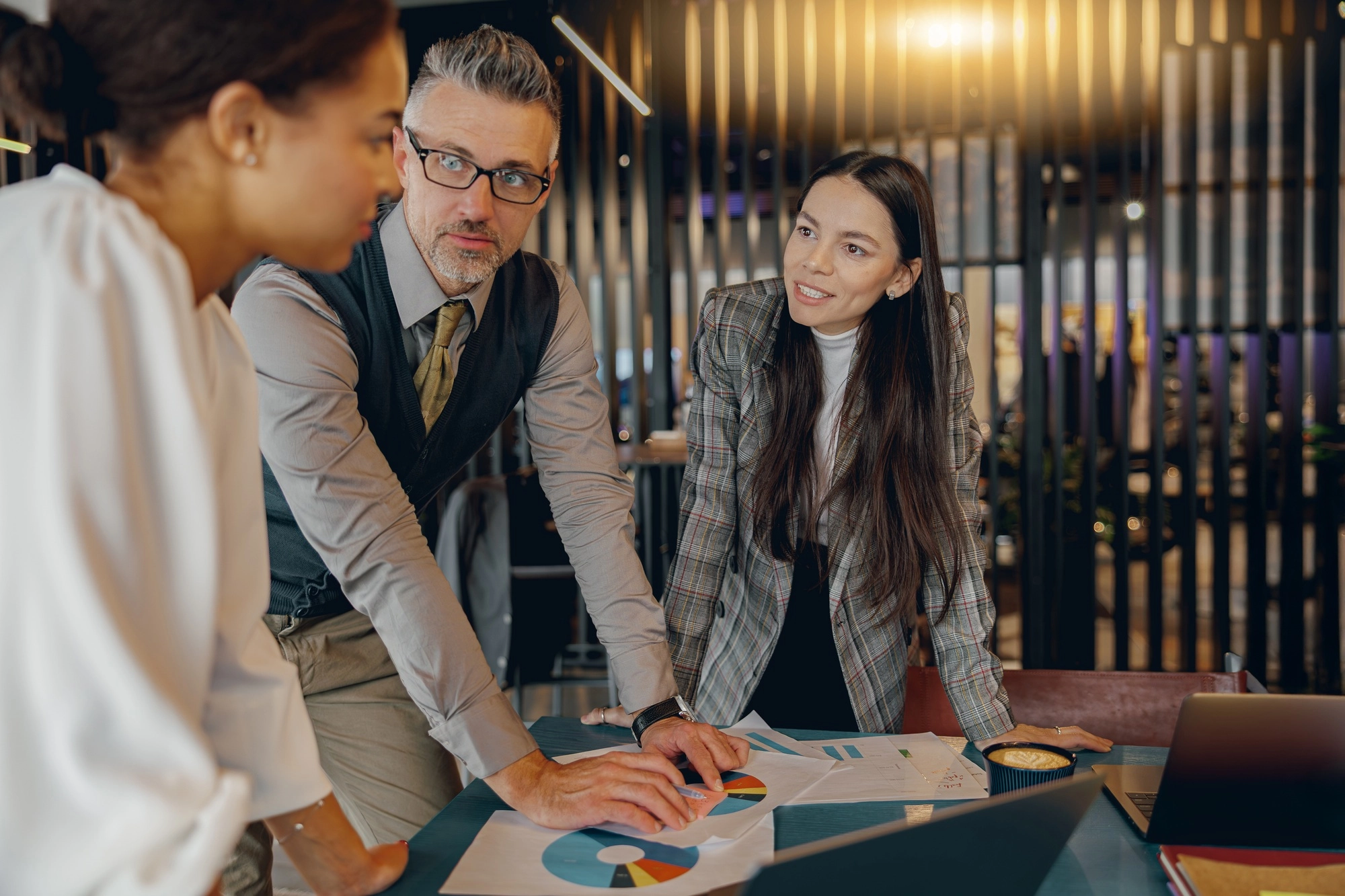 A collaborative business meeting that emphasizes the importance of thorough data analysis