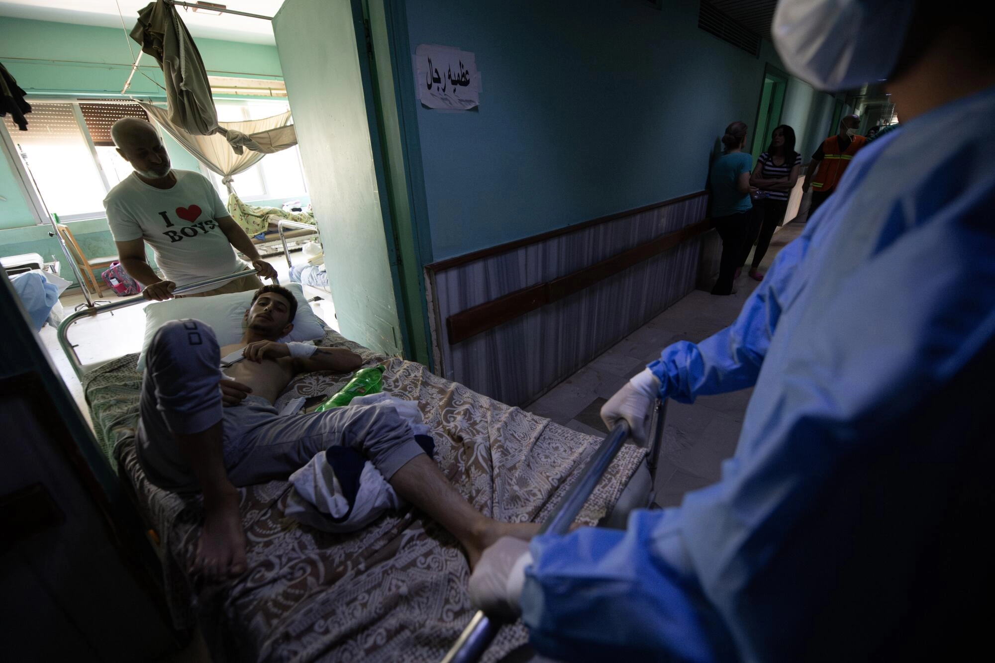One of the injured from the city of Sweida receiving treatment at the National Hospital