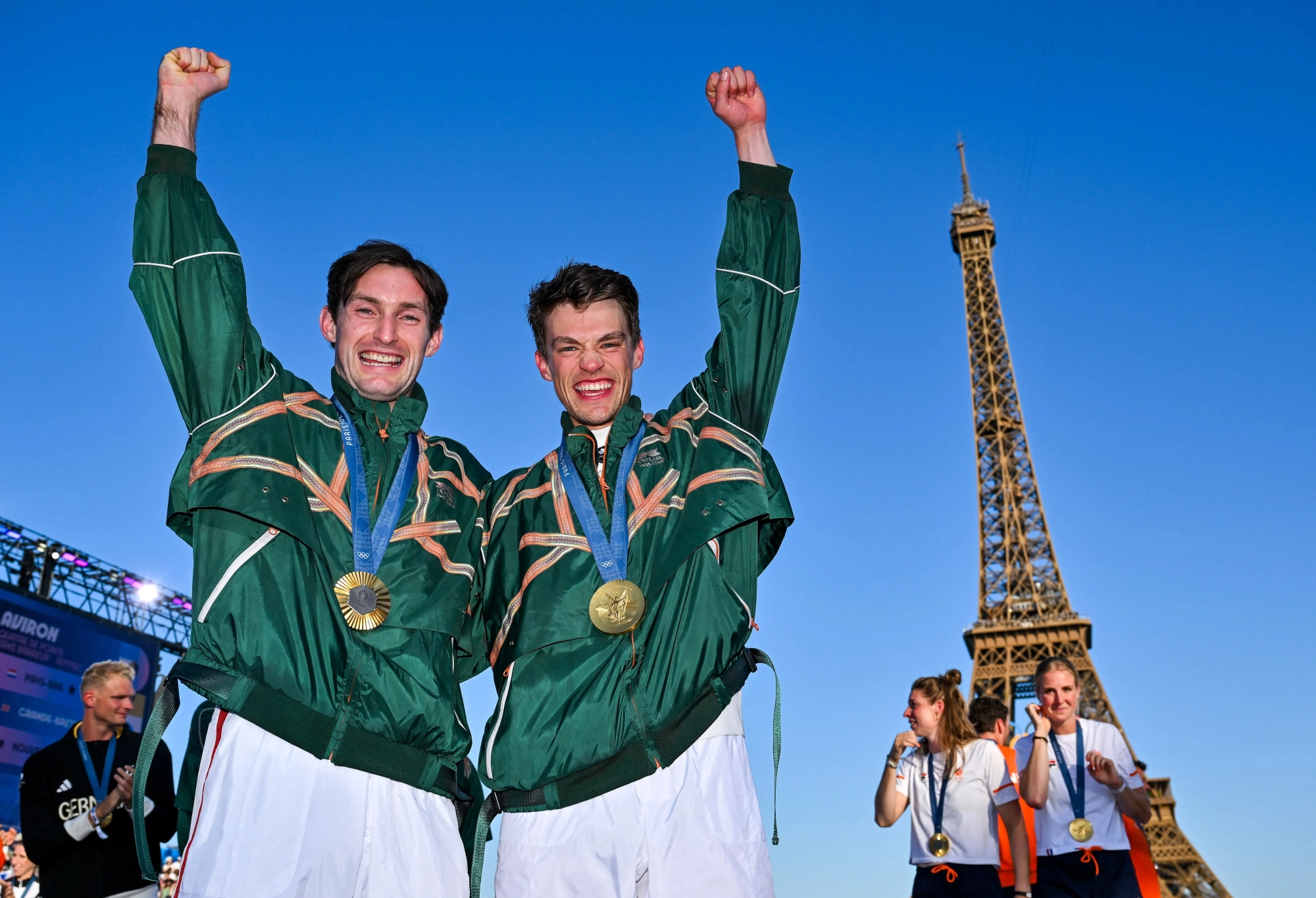 Irish Olympic champions Paul O'Donovan and Fintan McCarthy with gold medals in Paris.
