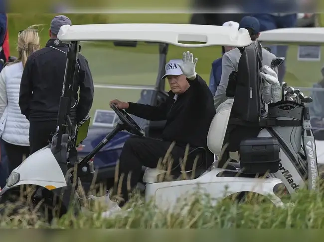 Trump plays golf in Scotland while protesters take to the streets and decry his visit