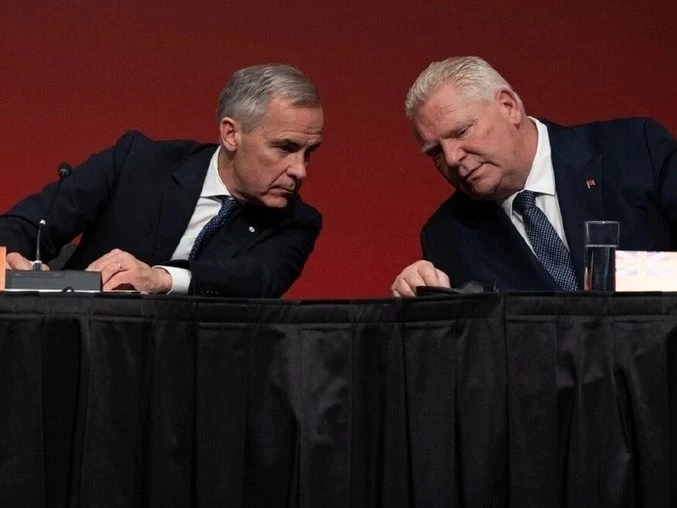 Prime Minister Mark Carney, left, and Ontario Premier Doug Ford hold a press conference after the first ministers meeting at TCU Place in Saskatoon, Sask. on Monday, June 2, 2025.