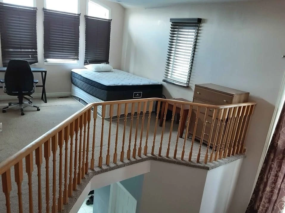 Brampton rental listing is for bed on second-floor landing.