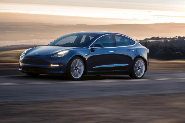Tesla Driver Gets A Ticket At GM Plant For Parking A Foreign Car In Domestic Lot - autojosh