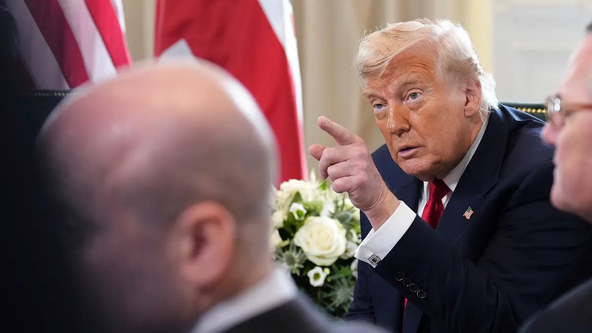 President Donald Trump speaks with the media
