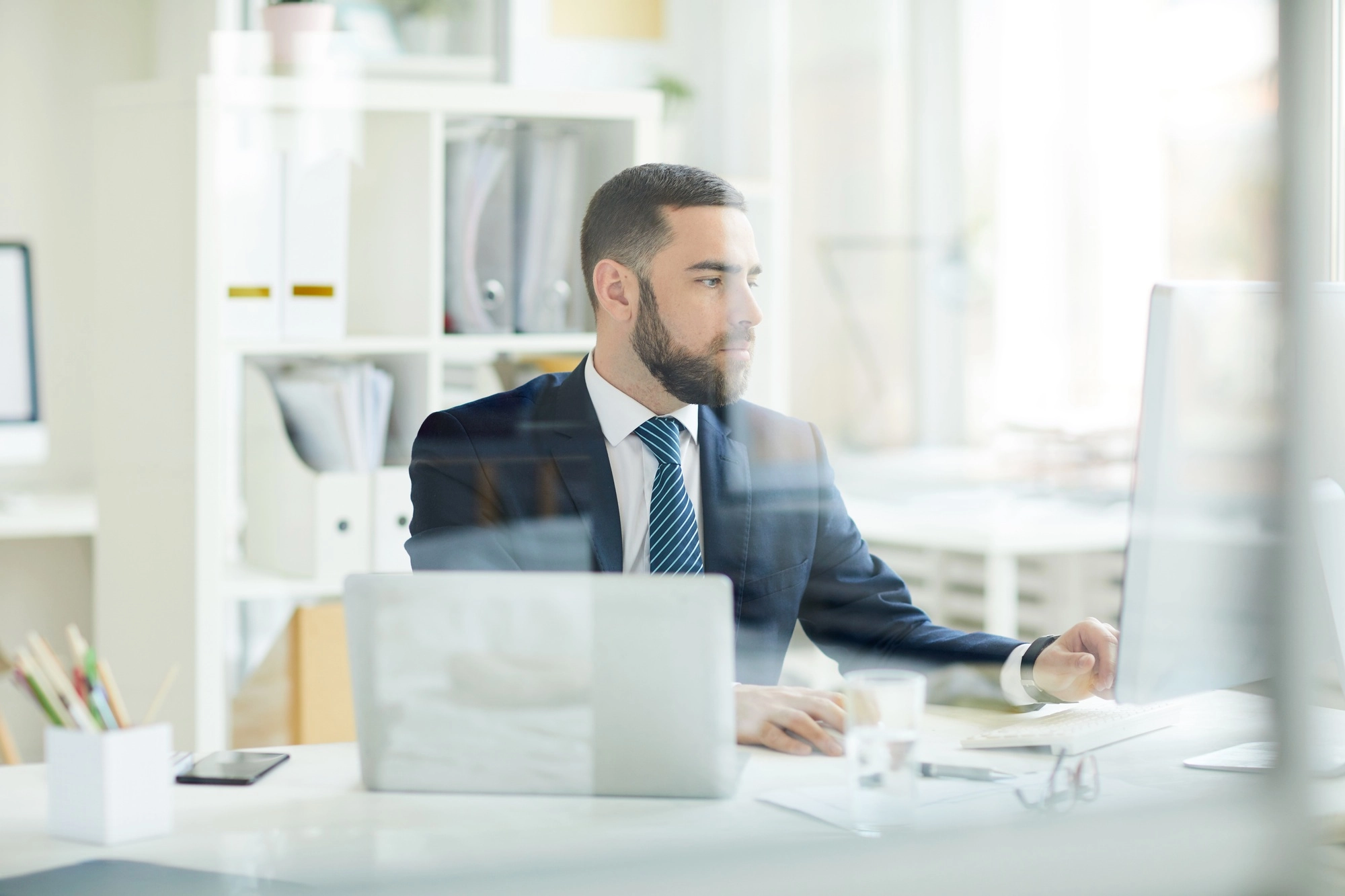 Business analyst making financial forecast