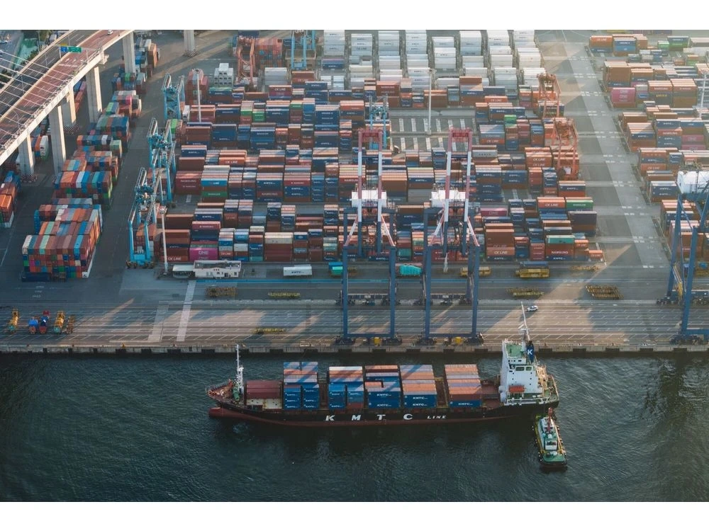 A container ship approaches the Busan Port Terminal (BPT) in Busan, South Korea, on Wednesday, July 23, 2025. South Korea is scheduled to release its gross domestic product (GDP) figures on July 24.