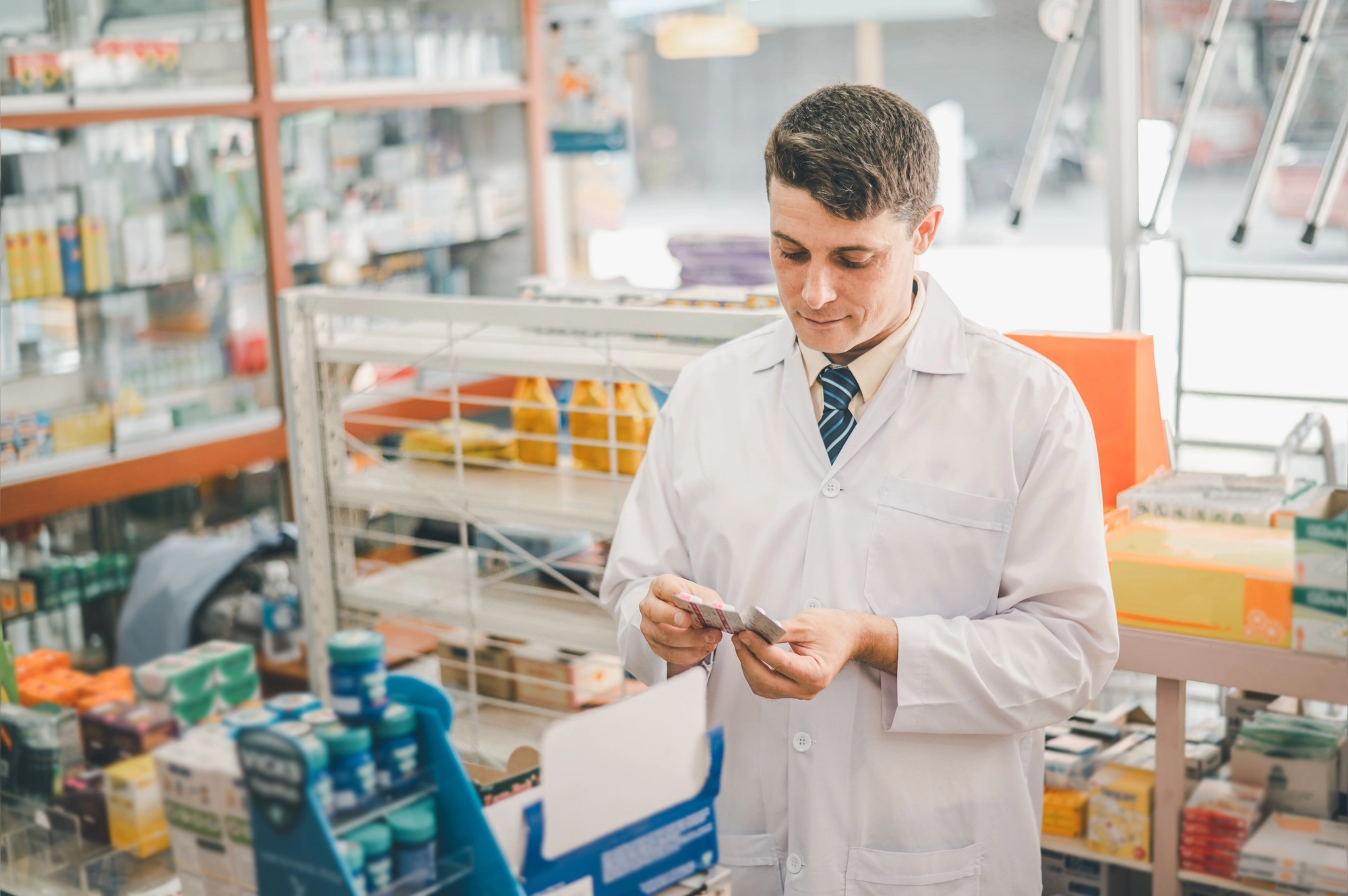 Pharmacist checking Checks Inventory of Medicine