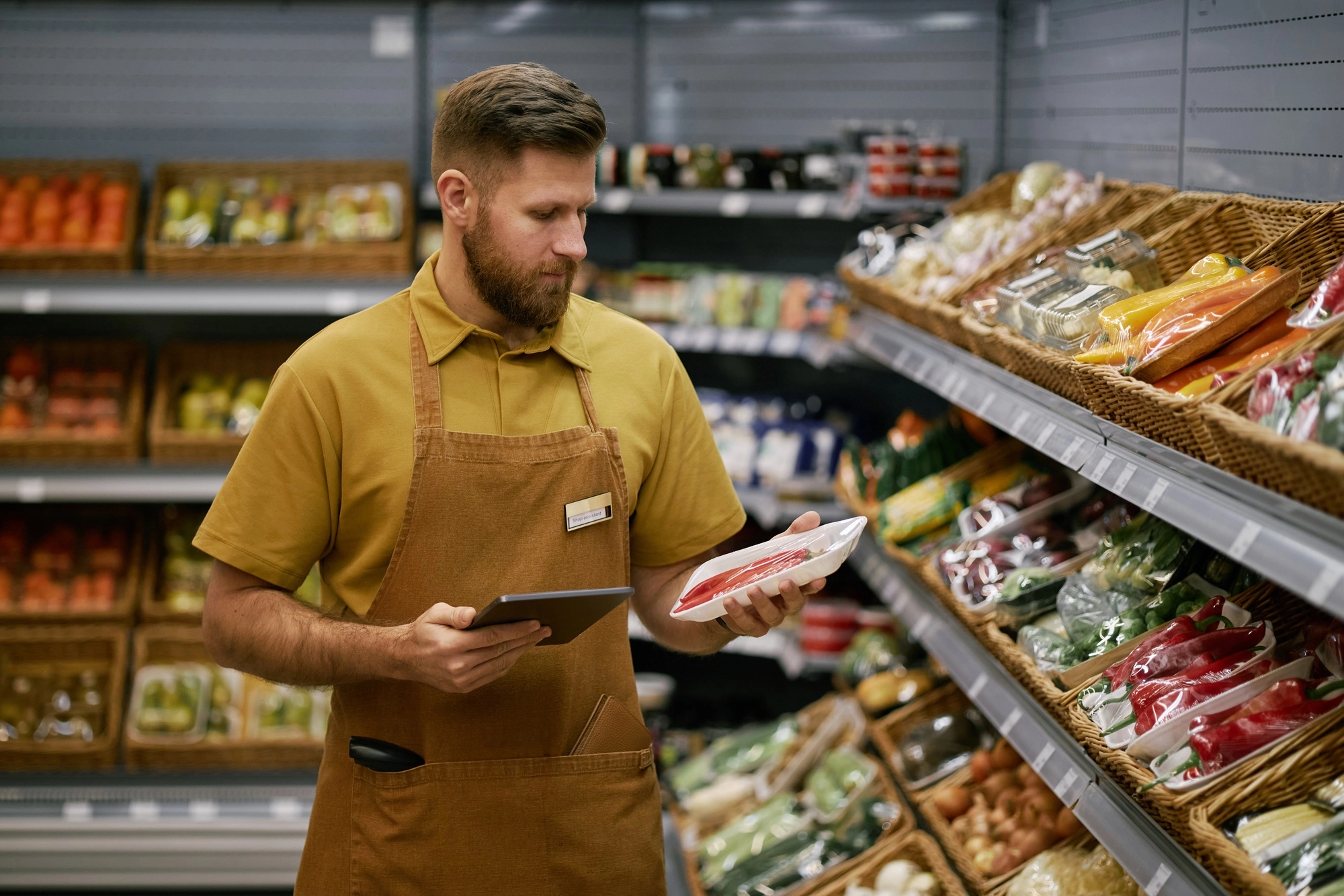 Grocery Store Worker Checking Product Inventory