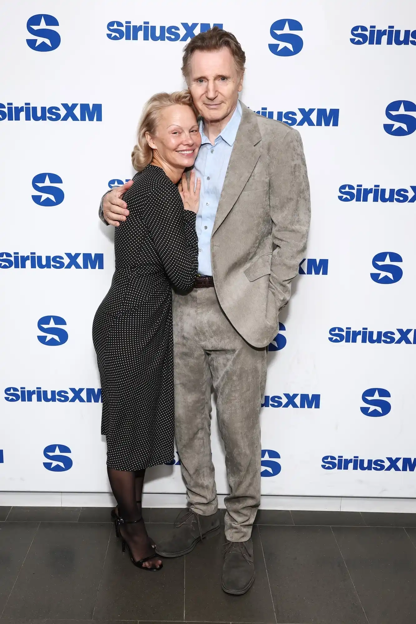 GettyImages-2227746075 Liam Neeson Reveals 1st Impression of 'Hot' Pamela Anderson Amid Romance